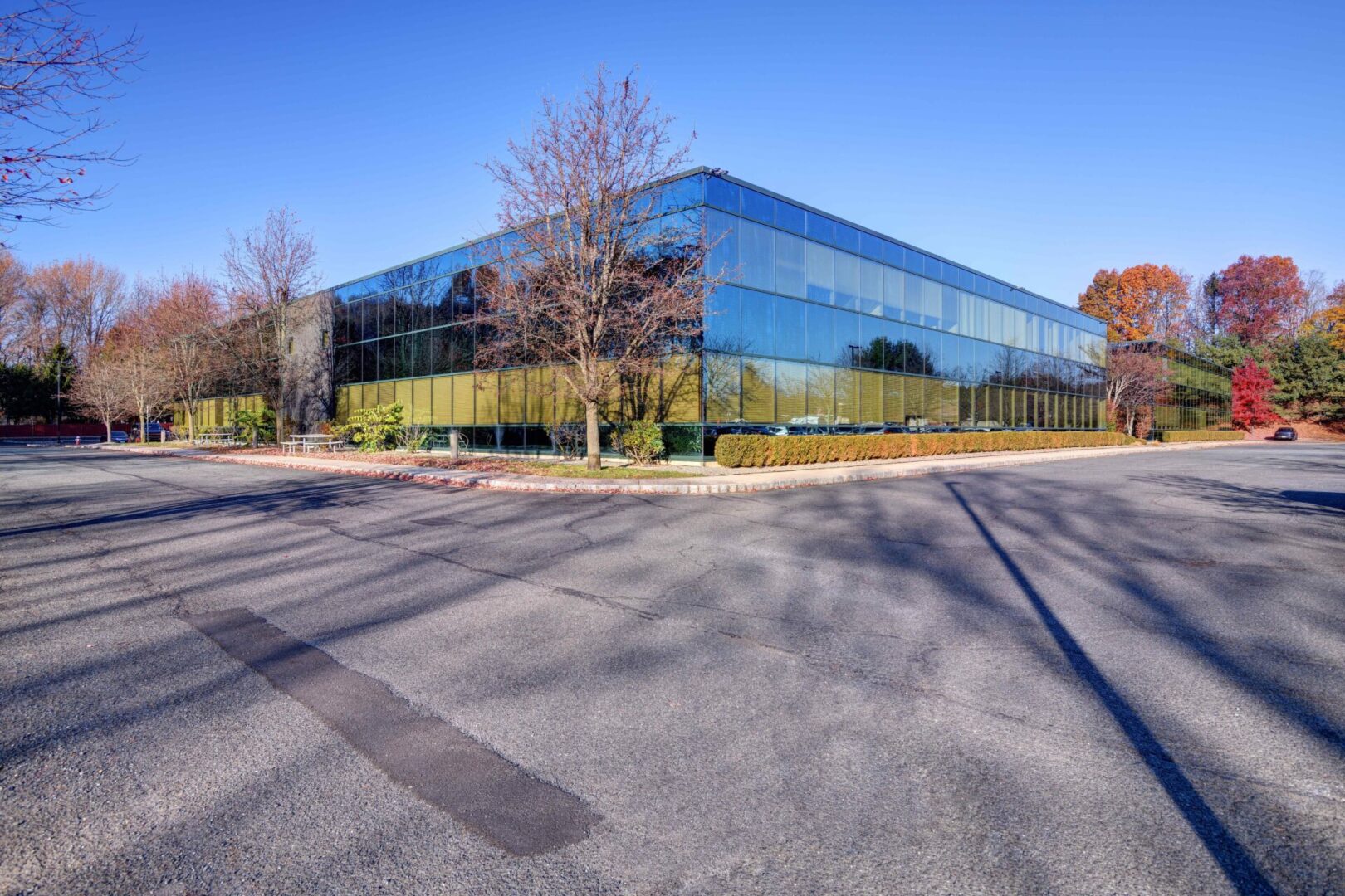 A large building with many windows on the side of it.