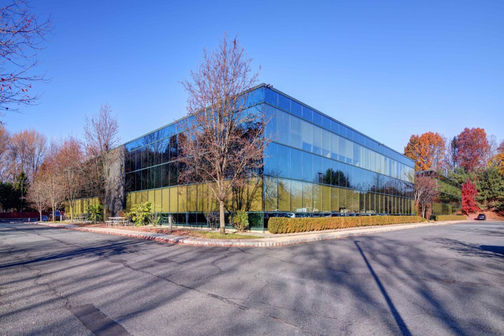 A large building with many windows on the side of it.