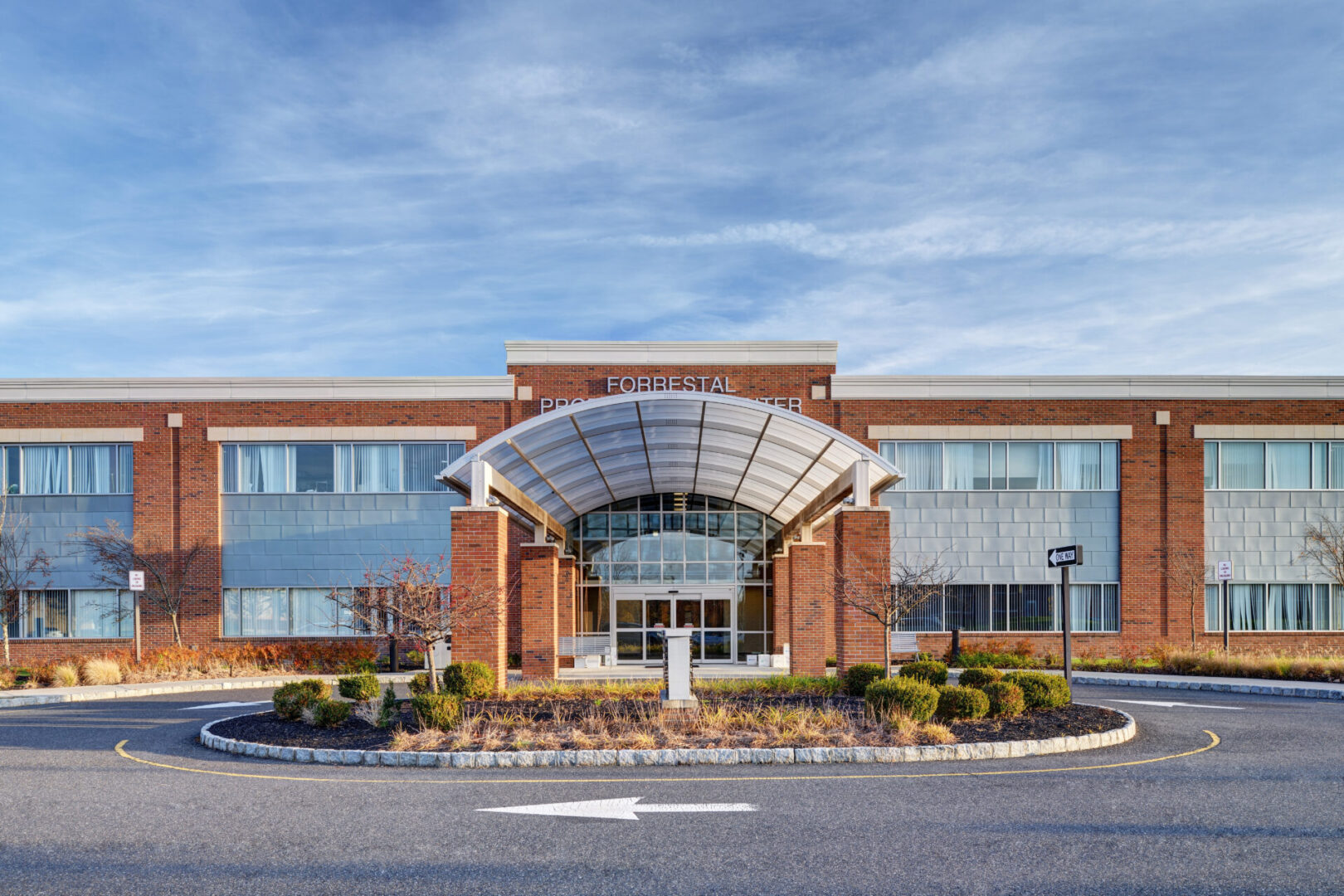 A large building with a lot of windows on the outside.